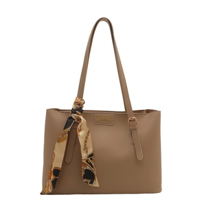 Khaki faux leather tote bag with fashion tag and decorative chain pattern scarf