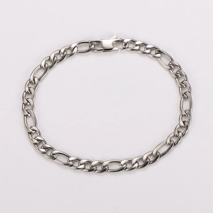 Detailed view of silver stainless steel Figaro chain bracelet with spring clasp closure