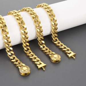 11mm golden stainless steel Cuban link chains with diamond-set round and spike clasps