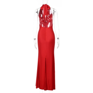 Detail of red backless halter satin dress with elegant bow tie back on a mannequin