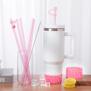 Glittery pink silicone boot and straw cover set for stainless steel tumbler with brush