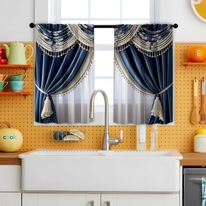 Blue and cream kitchen curtains with valance and tassels shown in a cozy kitchen setting