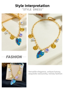 Detailed close-up of mixed element charms with blue enamel heart and ceramic flowers