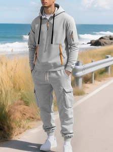Men's grey fleece tracksuit with orange zippers and tactical cargo pockets set