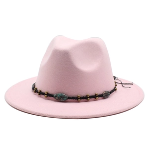 Pink wool fedora hat with wide flat brim and bohemian ethnic beaded band for women