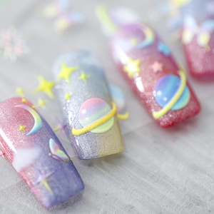 5D embossed space nebula nail stickers with 3D crystal planet and butterfly designs