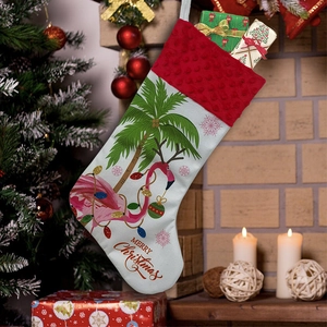 Detailed view of white flamingo Christmas stocking hanging on a cozy fireplace mantle