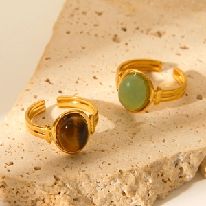 French vintage style open ring with tiger eye and green chalcedony on a natural stone base