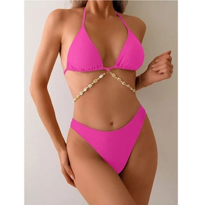 Detail of hot pink bikini set with shell body chain and high-cut bottoms for beach parties