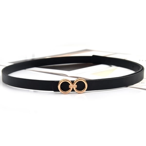 Minimalist black leather belt with golden double ring buckle for women on white background
