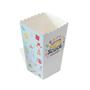 Detail of school snack box with wavy edges and colorful back to school prints