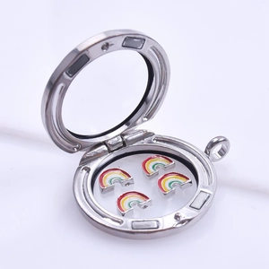 Macro shot of silver glass floating locket showing colorful rainbow charms inside