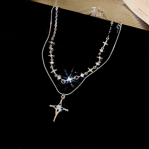 Double-layered silver star necklace with rhinestone cross charms and opal pendant