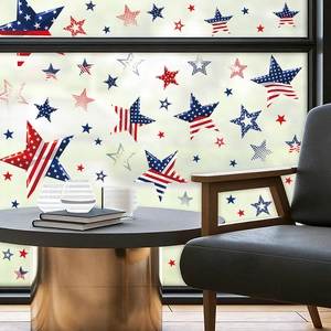 Independence Day red white and blue star window clings on glass with modern home interior