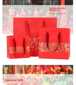 Detailed set of red Chinese-style gift bags with floral patterns and silk ribbon handles