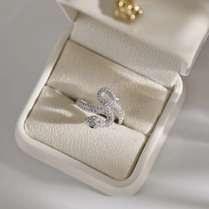 Exquisite snake-shaped silver ring with sparkling pavé zircons in a luxury gift box