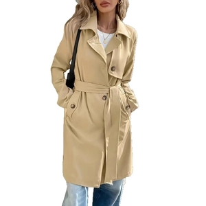 Detail of khaki trench coat featuring a notched lapel and adjustable waist belt tie