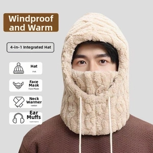 Detailed close-up of 4-in-1 winter faux fur bucket hat with thick cable knit texture
