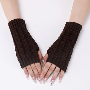 Detail of dark brown cable knit fingerless gloves showing texture and wrist coverage