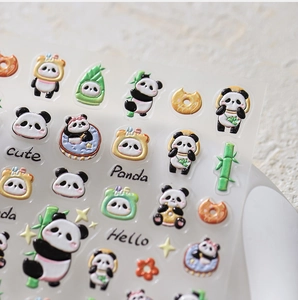 Detailed macro view of 3D embossed cute panda stickers with glossy resin texture