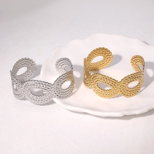 Minimalist open woven stainless steel cuff bracelets in gold and silver finish