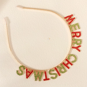 Golden metal headband with Merry Christmas rhinestone letters for holiday parties
