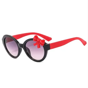 Kids bowknot sunglasses with red and black frame and round gradient purple lenses