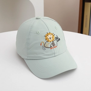Detail of mint green quick-dry sun hat with embroidered cartoon lion and air vents