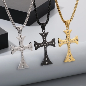 Hip hop iced out cross pendants in silver, black, and gold with sparkling rhinestones
