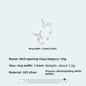 Macro shot of 925 sterling silver flying bird open ring with detailed adjustable band