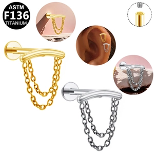 Detail of G23 titanium labret stud featuring a dual chain dangle and internal threading