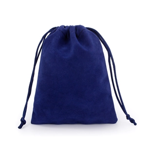 Close-up of a blue soft velvet drawstring pouch for jewelry storage and gift packaging