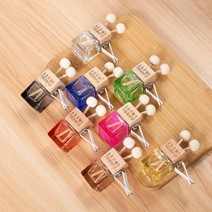 Square glass car perfume bottles with wooden lids and diffuser sticks in multi-color sets