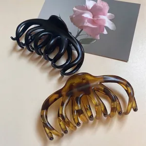 French vintage leopard print and matte black octopus hair claw clips for thick hair