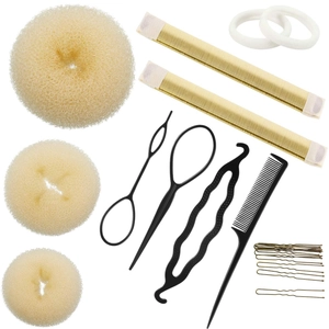 Macro shot of a complete professional hair styling kit with bun makers and tail comb