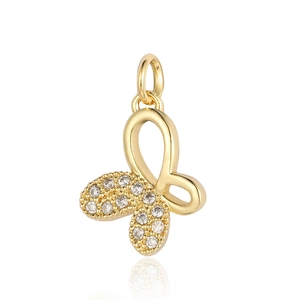 Detailed view of a gold butterfly charm with sparkling cubic zirconia on white background