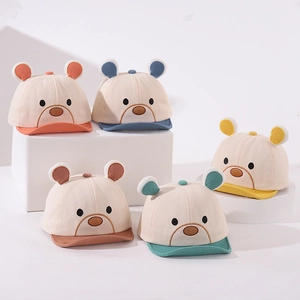 Collection of soft brim baby baseball caps with cute bear embroidery in various colors