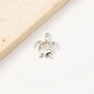 Detailed view of silver stainless steel sea turtle pendant for DIY beach necklaces