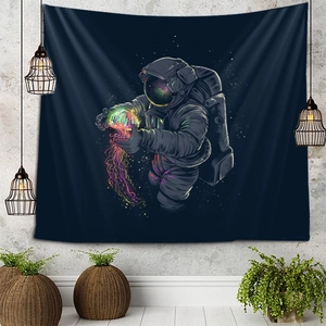 Cosmic wall tapestry featuring an astronaut holding a jellyfish in a modern room setup