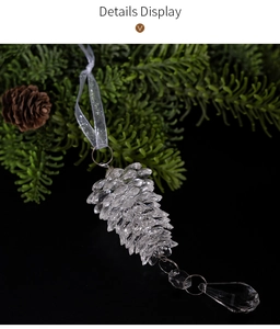 Detail view of transparent acrylic pine cone pendant with crystal waterdrop ornament