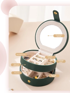 Detail view of double-layer travel jewelry box with mirror and ring storage sections