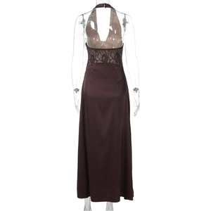 Detail view of brown backless satin dress showing intricate lace patchwork and slim fit