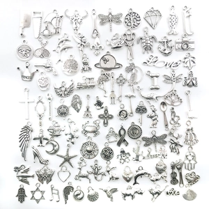 Mixed set of vintage silver alloy charms for DIY jewelry making with diverse shapes
