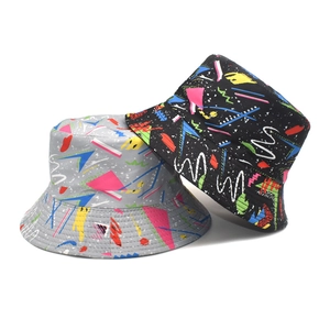 Graffiti bucket hats in black and grey with vibrant geometric patterns for outdoor wear