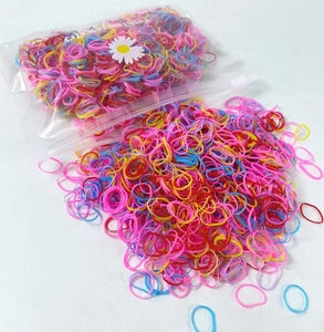 Detail shot of colorful high-elasticity rubber bands in a transparent daisy branded bag