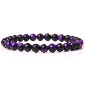 Detailed view of 6mm polished purple tiger eye natural stone beads on elastic bracelet