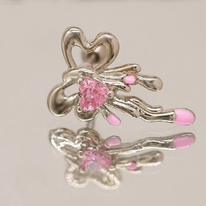 Minimalist silver bow heart stud earrings with pink zircon and glossy enamel finish