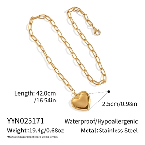 Detail showing 18K gold plated stainless steel heart pendant with dimension markings