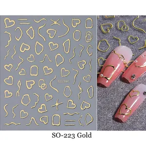 Detail of laser rose gold heart nail stickers with 3D metallic textures and line art