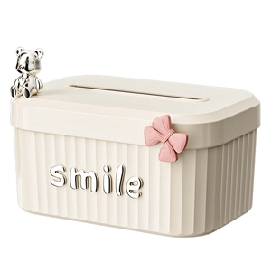 Modern cream tissue box with pink bow and silver bear decor for living room tabletop